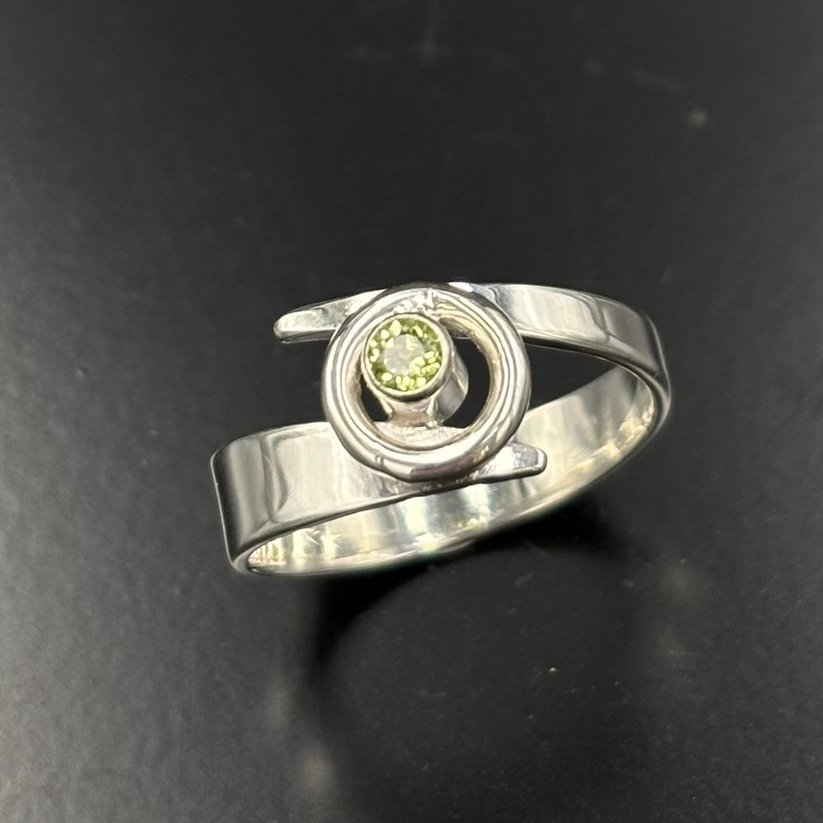 Kiera- Sterling silver peridot bypass ring