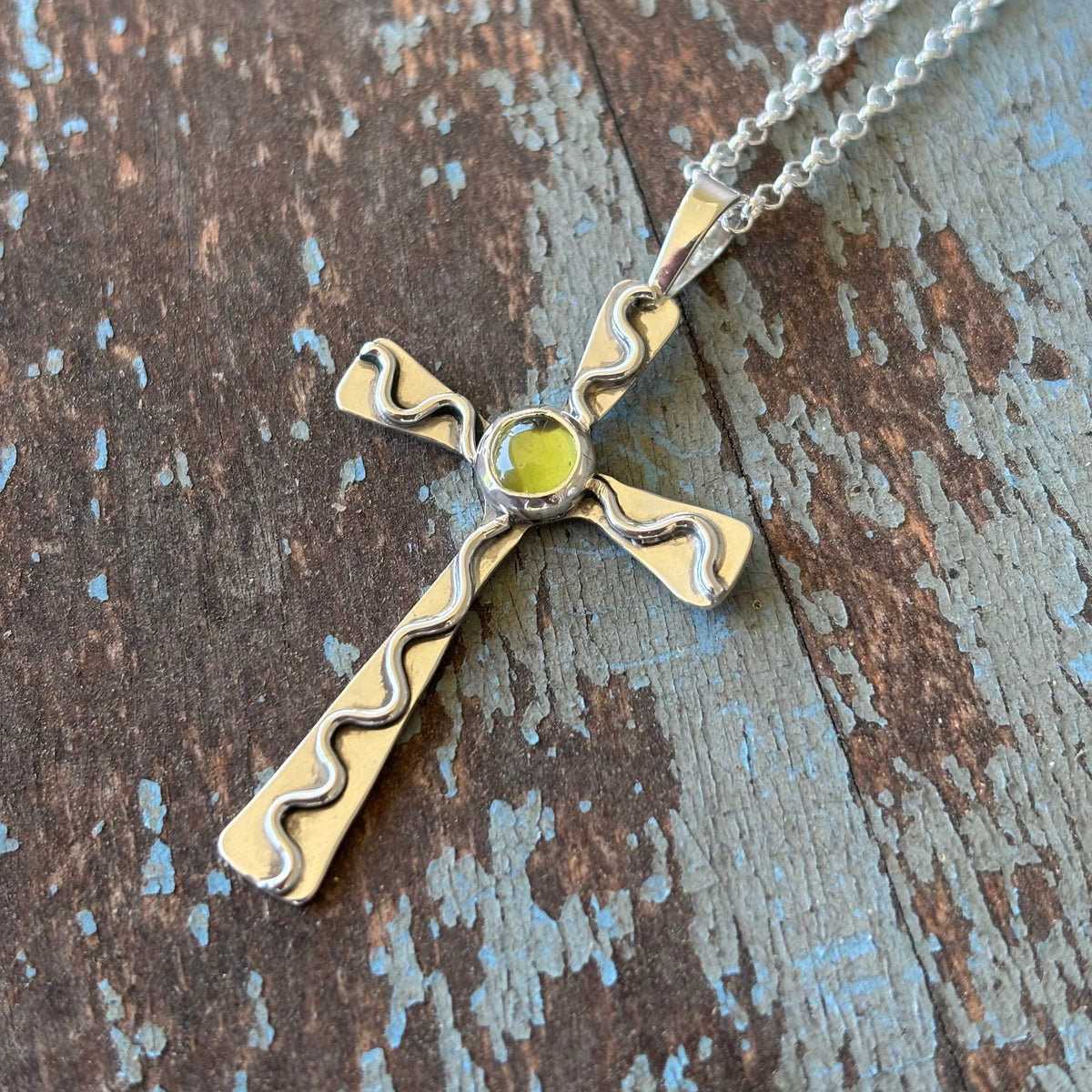 Cross- Sterling silver and peridot cross pendant