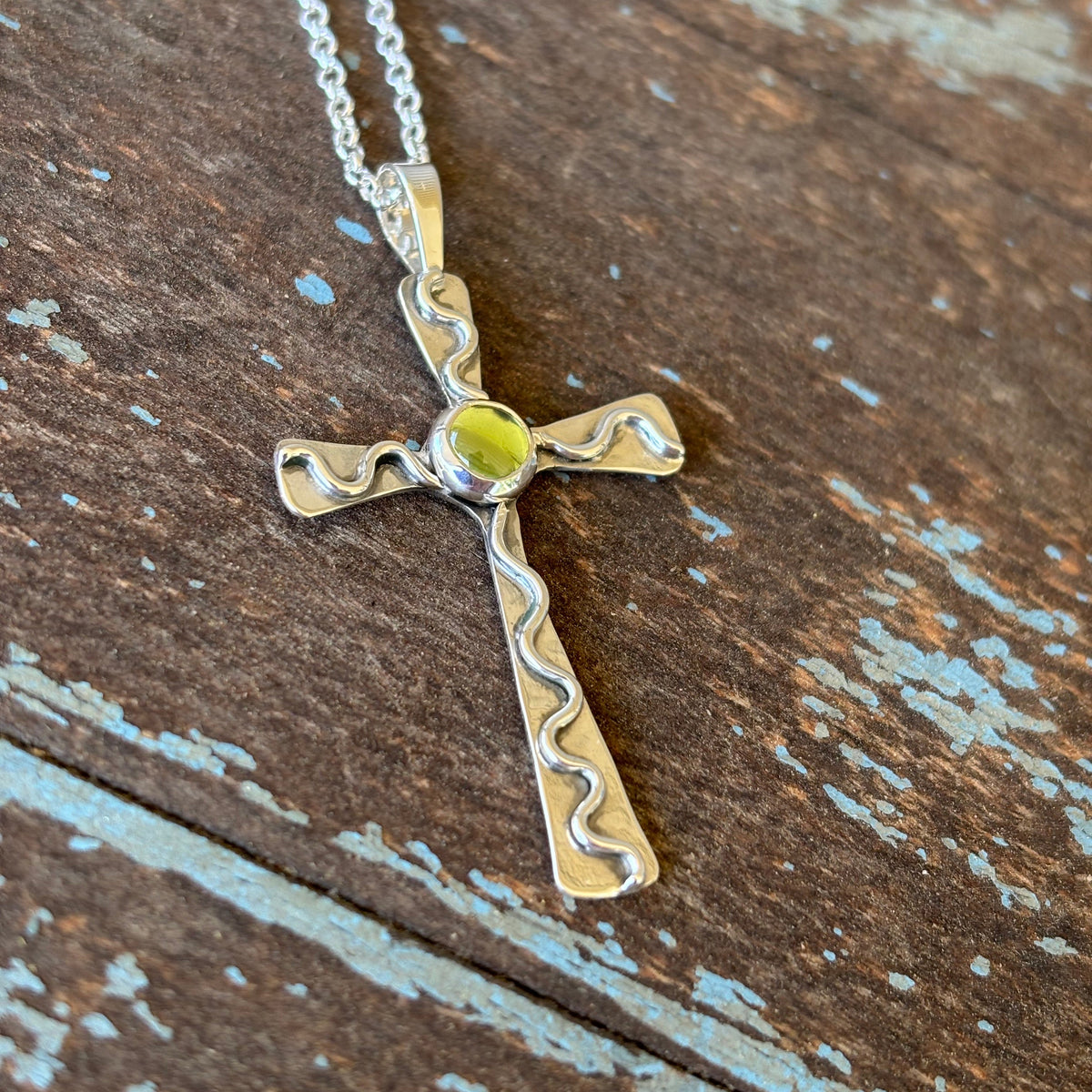 Cross- Sterling silver and peridot cross pendant
