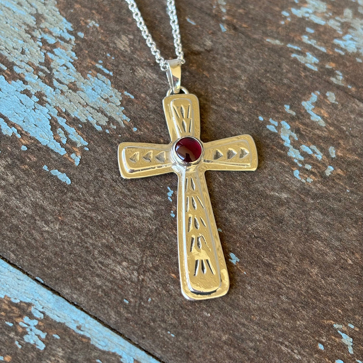 Cross- sterling silver and garnet cross pendant