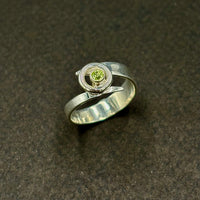 Kiera- Sterling silver peridot bypass ring
